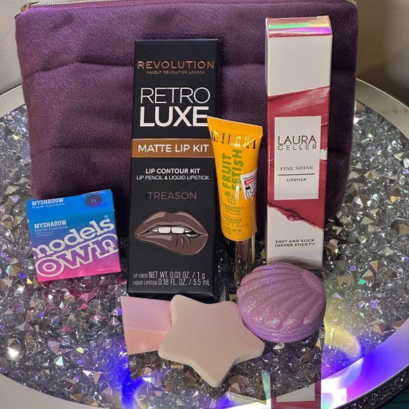 Purple Makeup Bag with Makeup Bundle. Retail value: $71.00 - Picture 1 of 2